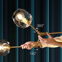 Lustre Sky ajustable en doré à 8 globes en verre