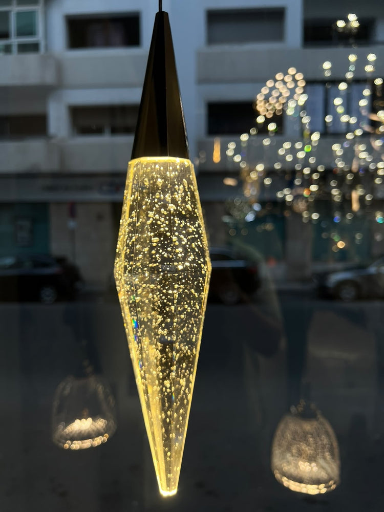 Suspension Diamante — photo réelle au showroom